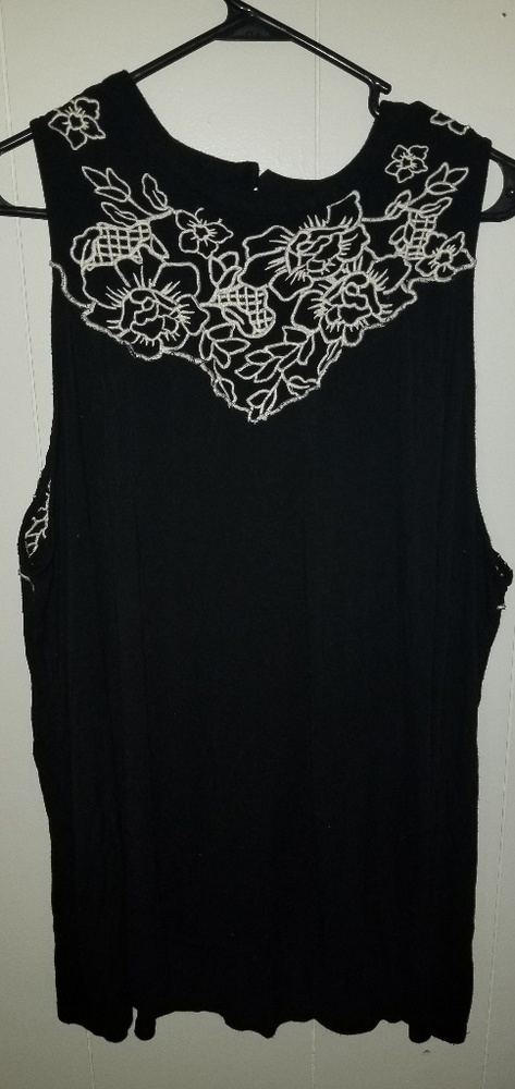 High neck tank top. Peekaboo back